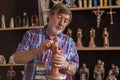 Religious figurine artisan in fair