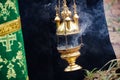 Golden censer smoke