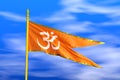Religious Hindu Om Aum Flag during Daylight and beautiful sky - 3D Illustration Rendering Royalty Free Stock Photo
