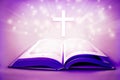 Religious holy bible with cross and purple colors lent easter concept Royalty Free Stock Photo