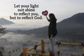 Religious inspirational quote - Let your light not shine to reflect you, but to reflect God. With woman holing God s love sign. Royalty Free Stock Photo