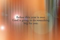 Religious inspirational quote - Before this year is over, God is going to do something big for you. On orange abstract Royalty Free Stock Photo