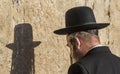 Religious man praying at the Western wall. Jerusalem, Israel