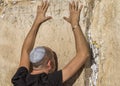 Religious man praying at the Western wall. Jerusalem, Israel