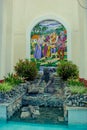 religious monuments with fountain next to a basilica