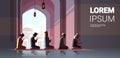 religious muslim men kneeling and praying inside mosque ramadan kareem holy month religion concept full length copy