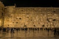 The religious people praying at Western wall at Jerusalem Old Town during the night in Israel. Royalty Free Stock Photo