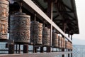 Religious prayer wheel for meditation in a Buddhist temple in Buryatia, Russia Ulan-Ude.