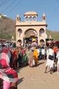 Religious public procession in India outside a temple