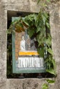 Religious scene on stained glass window in abandoned church on Yim Tin Tsai, an island in Sai Kung, Hong Kong Royalty Free Stock Photo