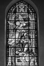 Religious scene on stained glass window inside the cathedral of Castellon de la Plana, Spain Royalty Free Stock Photo