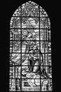 Religious scene on stained glass window inside the cathedral of Castellon de la Plana, Spain Royalty Free Stock Photo