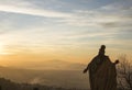 Religious silhouettewith sunset blue and yellow sky Royalty Free Stock Photo