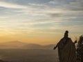 Religious silhouettewith sunset blue and yellow sky Royalty Free Stock Photo
