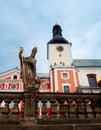 Religious statue in front of St Adalbert Church of Benedictine Abbey. Broumov, Czech Republic