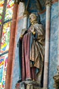 Religious stone carving of Holy Mary in the interior of St. Lorenz St. Lawrence; a medieval church in the city of Nuremberg in Royalty Free Stock Photo