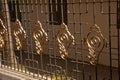 Religious symbol Shankh as a decorated part of metal gate