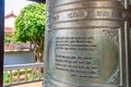Religious text on old metal bell in a pagoda in Dalat Vietnam