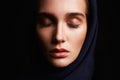 Religious young woman.beauty girl in hood Royalty Free Stock Photo