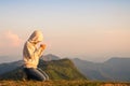 Religious young woman praying to God in the morning, spirtuality and religion, Religious concepts Royalty Free Stock Photo