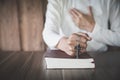 Religious young woman praying to God in the morning, spirtuality and religion, Religious concepts Royalty Free Stock Photo