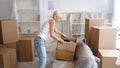 Relocation stress moving belongings woman boxes