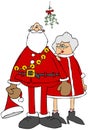 Reluctant Santa & Mrs. Claus standing under the mistletoe Royalty Free Stock Photo