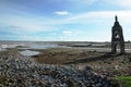 Remain of fallen church on the beach