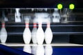 5 remaining bowling pins after the first throw, background night light Royalty Free Stock Photo