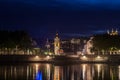 Panorama of Presqu`ile district in Lyon at Night with the Basilique de Fourviere Church and Clocher de la Charite Clocktower. Royalty Free Stock Photo