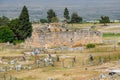 remains of the ancient antique buildings of Hierapolis from limestone blocks, dilapidated walls