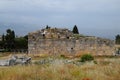 remains of the ancient antique buildings of Hierapolis from limestone blocks, dilapidated walls