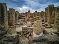 The remains of ancient columns. The Tombs of the Kings. Paphos. Cyprus. Royalty Free Stock Photo