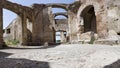 Remains of an ancient Roman tenement and frigidarium located in archeological excavation of Ostia Antica, Rome Italy