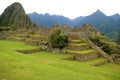 Remains of Ancient Structures in Machu Picchu Inca Citadel on the Mountainside of Cusco Region, Archaeological site in Peru Royalty Free Stock Photo