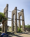 Remains of ancient water tank pillars of railway water tank that was washed away in cyclone of 1964 in Dhanushkodi