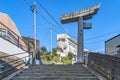 Remains of the atomic bomb-damaged torii arch of the Sanno shinto shrine in Nagasaki. Royalty Free Stock Photo