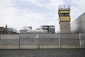 Remains of the Berlin Wall and watchtower Royalty Free Stock Photo