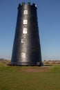 A black windmill on common land in Yorkshire