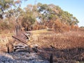 Remains of a burned down foot bridge after bush fire