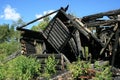 Remains of a burnt wooden house.