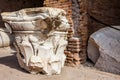 Remains of the capitals of the ancient columns at the Colosseum in Rome