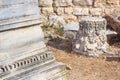 Remains of carved marble cornice and columns in the thermae of ancient Roman Odessos, close-up, in the city of Varna