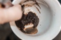 The remains of coffee and coffee grounds in a mug with a finished drink Royalty Free Stock Photo