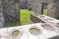 The remains of a counter where food was sold at the time of the devastating volcano eruption in Pompeii, Italy