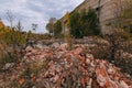 Remains of demolished old industrial building. Pile of stones, bricks and debris Royalty Free Stock Photo