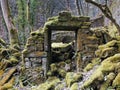 The remains of a derelict abandoned stone house