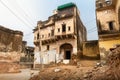 Remains of a deserted old Haveli with ornate painted frescos on the front in Mandawa, Rajasthan India