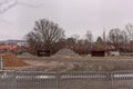 Remains of a football field being converted to a constructiuon site..