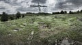 Remains of the former German concentration camp Plaszow with symbols of suffering - cross and barbed wire